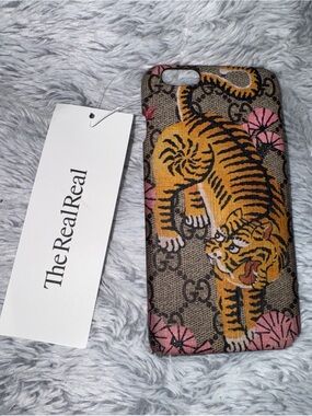 Gucci Brown Tiger Print Phone Case with Pink Floral Accents